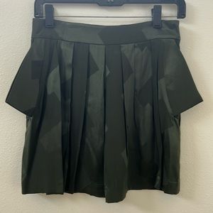 Balenciaga pleated green silk mini skirt. FR 38 (US 4/6)